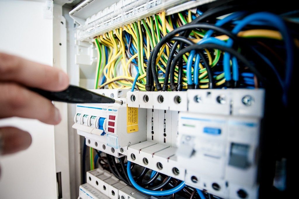 Engineer working on a network patch panel