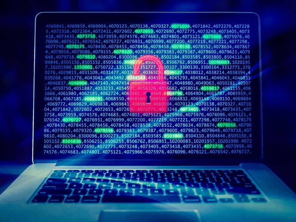 Cybersecurity concept with a padlock on a laptop screen